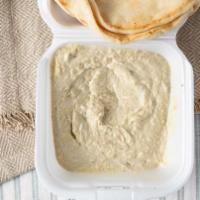 Hummus · Vegetarian. House blended chickpeas, tahini, and olive oil with fresh garlic and lemon juice...