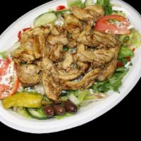 Chicken Shawarma Greek Salad · Classic greek salad served with chicken shawarma, includes pita bread and sauce.