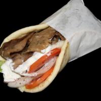 Gyro · Seared layers of select beef and lamb perfectly seasoned with zesty spices, broiled on a ver...