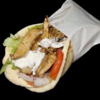 Chicken Shawarma · Juicy chicken thighs marinated with our special seasonings and grilled to perfection topped ...