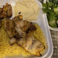 Chicken Kabob Plate · Tender chicken breast marinated in lemon juice, charbroiled to perfection, and served with y...