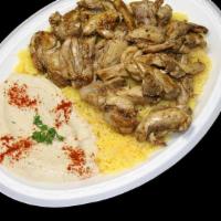 Chicken Shawarma Plate · Juicy chicken thighs marinated in our special seasonings and grilled to perfection, served w...