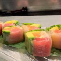 White Tower Roll · Tuna, salmon, mango, cucumber and avocado wrapped by rice paper with chef's special sauce