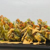 Spicy Girl Roll · (Fried roll)Spicy tuna, avocado topped with masago, scallion, eel. sauce, spicy mayo