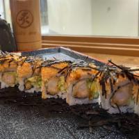 Angry Dragon Roll · Spicy. In: shrimp tempura and avocado. Top: spicy kani with unagi sauce, miso sauce, and kiz...