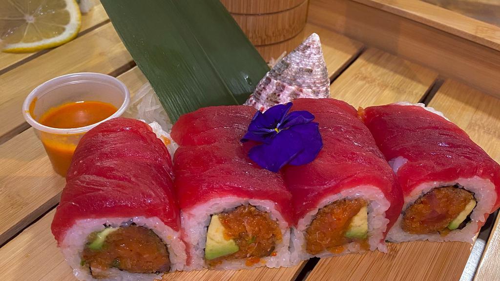 Red Dragon Roll · Spicy.  In:  spicy crunch tuna and avocado. Top: Fresh tuna with spicy mayo.