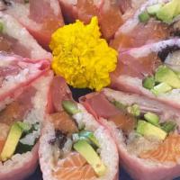 Ocean Queen · soy paper wrap
In: tuna, salmon, Yellowtail, albacore, jalapeño, and red onion with shiso fu...