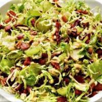 Brussel Sprout Slaw · Pecorino Romano, parsley, grapes, toasted almonds tossed in a sherry vinaigrette. Come in a ...