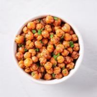 Crispy Harissa Chickpeas · Our signature crunchy chickpeas tossed in a spicy harissa seasoning