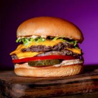 Signature Double Burger · Double beef patties, lettuce, tomatoes, hydrated onions, American cheese, pickles and classi...