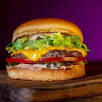 Signature Single Burger · A single beef patty, lettuce, tomatoes, hydrated onions, American cheese, pickles and classi...