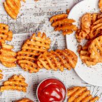 Seasoned Waffle Fries · Seasoned waffle fries served with your choice of one sauce.
