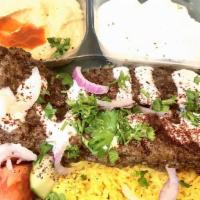 Kebab Beef Or Lamb · Best with hummus or baba ghanouj and garlic sauce with romaine lettuce, tomato, parsley, oni...