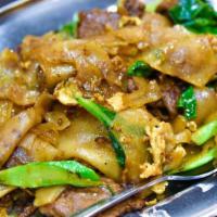 Pad See Ew · With rice noodles, stir-fried with Chinese broccoli, egg and Thai soy sauce