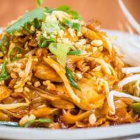 Pad Thai · Traditional stir-fried rice noodles with eggs, vegetables and tofu in a sauce of tamarind, f...