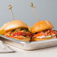 Lobster Sliders · 2.5 ounce lobster, brown butter, chives mayo, two slider buns.