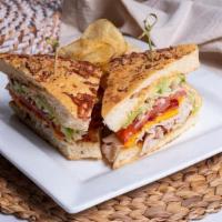 California Turkey Sandwich · Thin sliced turkey breast, bacon, American cheese, shredded lettuce, tomato and avocado with...