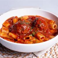 Spaghetti And Meatball · In our homemade tomato sauce.