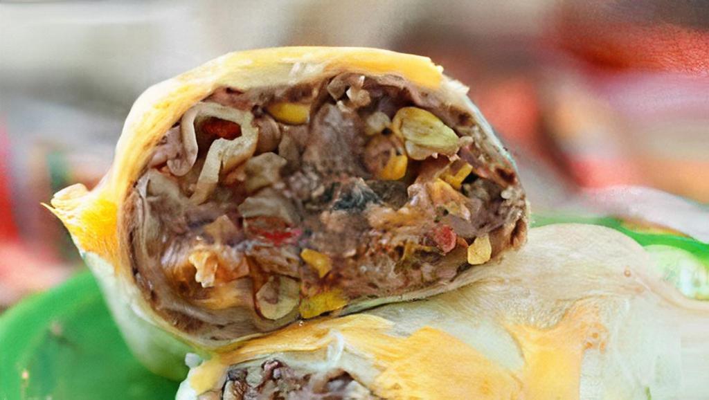 Bean And Cheese Burrito · Bean and Cheese Burrito with Brown Rice, Refried Beans, Guacamole, Pico de Gallo, and Cheese wrapped in a Flour Tortilla