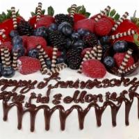 Simple Fruit Design Cake · The fruit design cake is iced in whipped cream with ganache drizzle and fresh fruit. Vanilla...