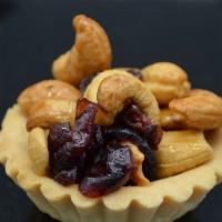 Nut & Cranberry Tarts · The tarts are filling with honey glazed nuts and cranberries.