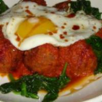 Persian Chickpea Kufteh · Chickpea croquettes with herbs and spices, Persian tomato sauce, sautéed greens, pomegranate...