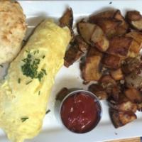 French Omelette · Ham, mushrooms, Gruyère, chives, potatoes and a biscuit.