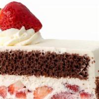 Brown Derby Cake Slice · Rich chocolate cake filled and iced with fresh whipped cream and layered with fresh sliced s...