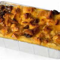 Bread Pudding · Freed's fresh-baked sliced challah baked in custard with cinnamon, nutmeg, and raisins. 1 fu...