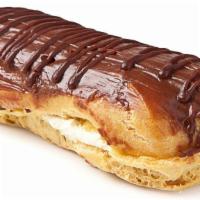 Eclair · Delicate pate a choux dough filled with freed's Bavarian cream and topped with homemade fudg...