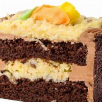 German Chocolate Cake Slice · Rich chocolate cake filled, topped with from-scratch coconut pecan custard, and iced with ch...
