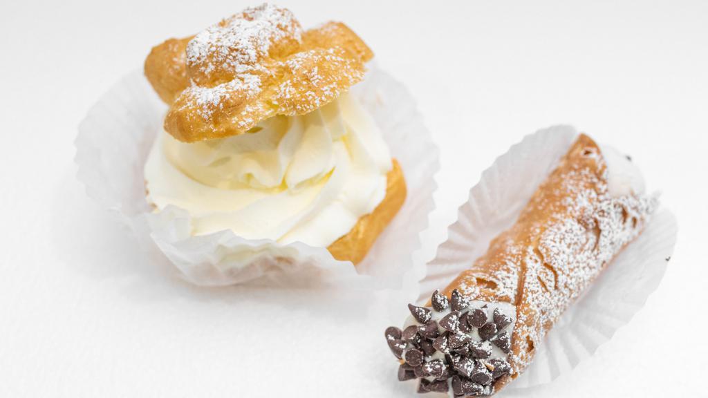 Cannoli · Cannoli pastry dough filled with a blend of sweet ricotta cinnamon, and chocolate chips. 1 cannoli.