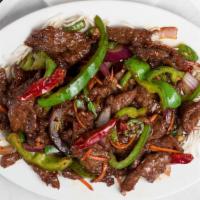 Mongolian Beef · Hot. Tender beef strips with skiced bell pepper, onion, and carrots stir fried in a spicy ma...