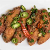 Salt & Pepper Chicken Wing (8 Pc) · Hot. Fried chicken wings sauteed w/salt and pepper.