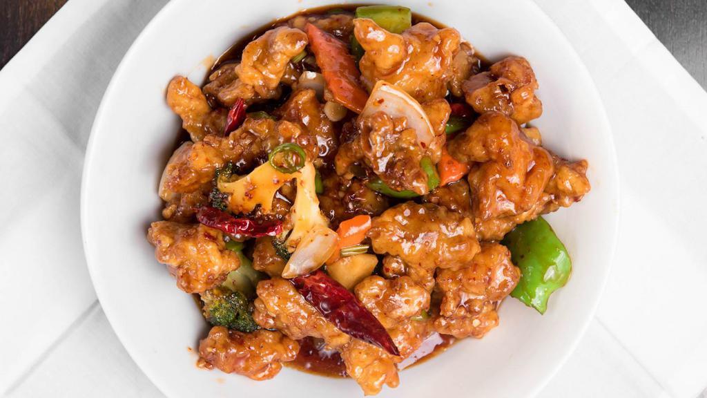 General Tso'S (House Special Chicken) · Hot. Tender, crispy chicken with broccoli. Bell peppers, onion, and pineapple stir fried in a spicy brown sauce.