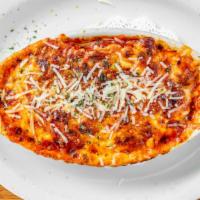Baked Lasagna · Wide pasta layered with Jay Berry's homemade meat sauce, spinach and loads of mozzarella che...