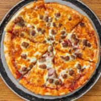 The Meat Lover'S · Pepperoni, Canadian bacon, salami, ground beef and Italian sausage.
