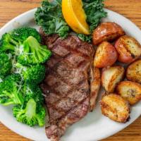 New York Steak* · Ten ounces of tender beef carefully charbroiled to order and served with fresh vegetables an...