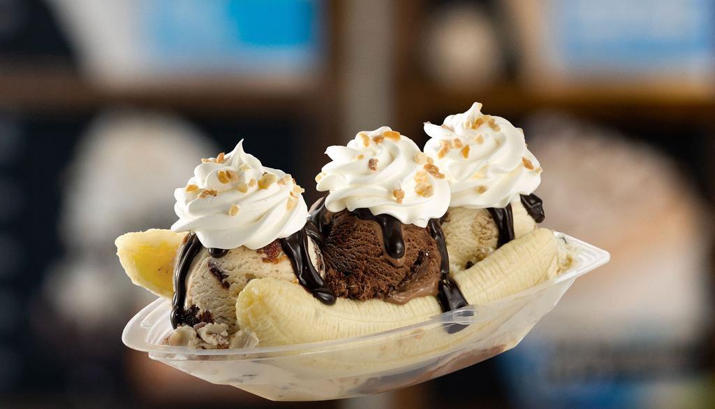 Banana Split (3 Scoops) · Includes one banana, three scoops of your favorite flavor(s), whipped cream, & three toppings of your choice!  Assembly required!