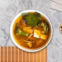 Tom Yum Soup · The most famous Thai spicy and sour soup with lemongrass broth. Choice - chicken, pork, tofu...