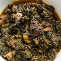 Palak Gosht · Mutton cooked on slow heat with spinach and indian herbs and served with aromatic basmati ri...