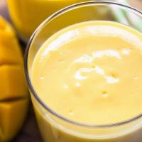 Mango Lassi · A perfect blend of Mango pulp mixed with milk makes for an awesome refreshing tasteful smoot...