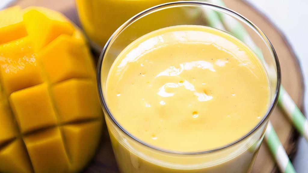 Mango Lassi · A perfect blend of Mango pulp mixed with milk makes for an awesome refreshing tasteful smoothie.