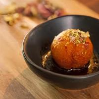Gulab Jamun · A popular dessert made up of fried milk balls dipped in sweet syrup made with cardamon flavo...