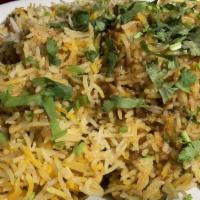 Chicken Biryani · Our long grain basmati rice cooked with chicken marinated in yogurt and house spices fresh v...
