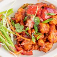 Chili Chicken · Battered chicken tossed with spicy sauce.