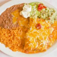 Chimichangas · two flour tortillas stuffed with shredded beef or chicken, deep-fried, and smothered in gree...