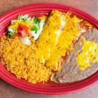 Spinach Enchiladas · Two enchiladas filled with spinach, tomatoes, and onions. Topped with Jack cheese and green ...