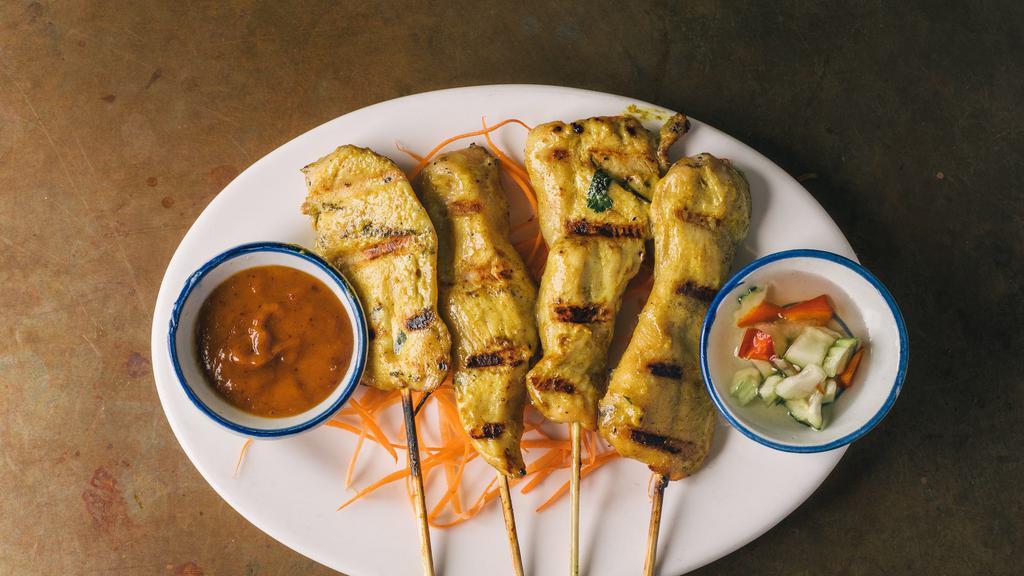 4 Skewers Chicken Satay · Bbq chicken marinated in coconut milk and a mixture of thai spices. Served with famous peanut sauce and cucumber salad.
