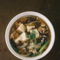 Tofu Soup · Bean thread noodle, napa cabbage, spinach, celery, onion and soft tofu in a clear broth. Ava...